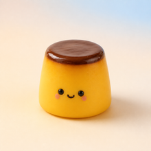 Caramel Pudding slow-rise stress-relief product with classic caramel top and a friendly face