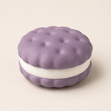 NOLLUMI Sandwich Cookie Squishy in Taro Purple, with scalloped purple layers, soft dimples and white cream filling